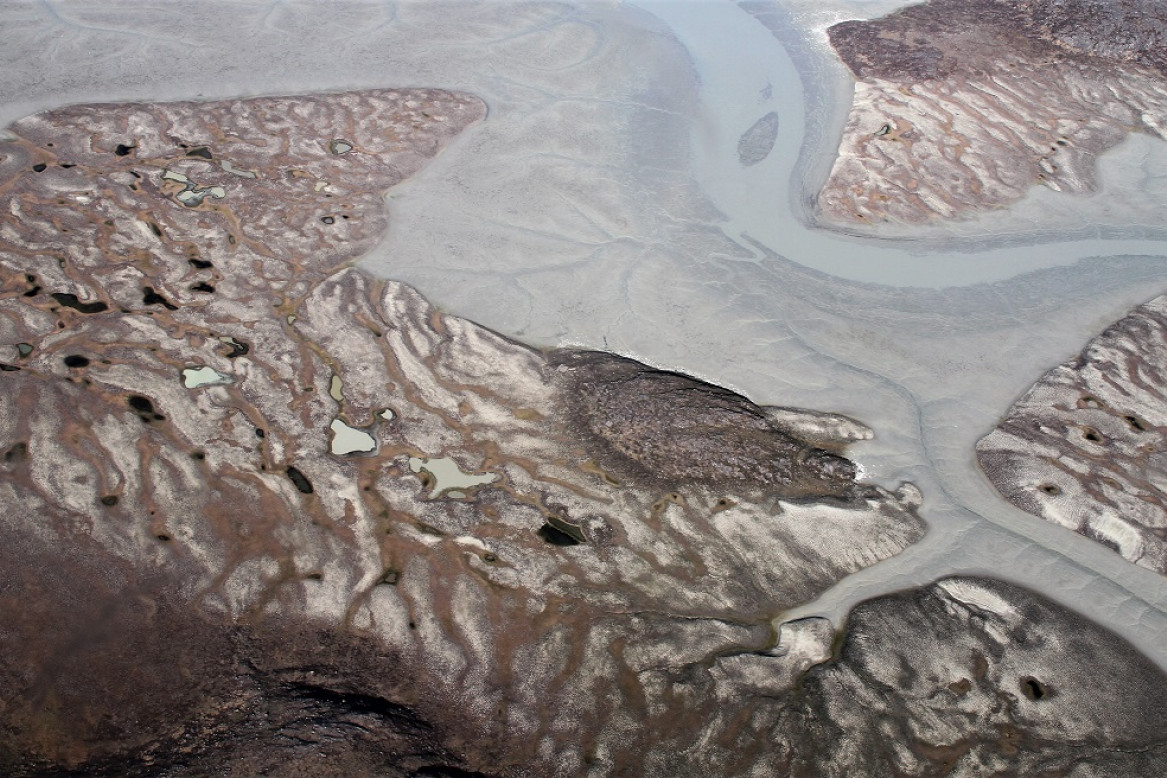 Luftfoto af gletsjermel i Grønland